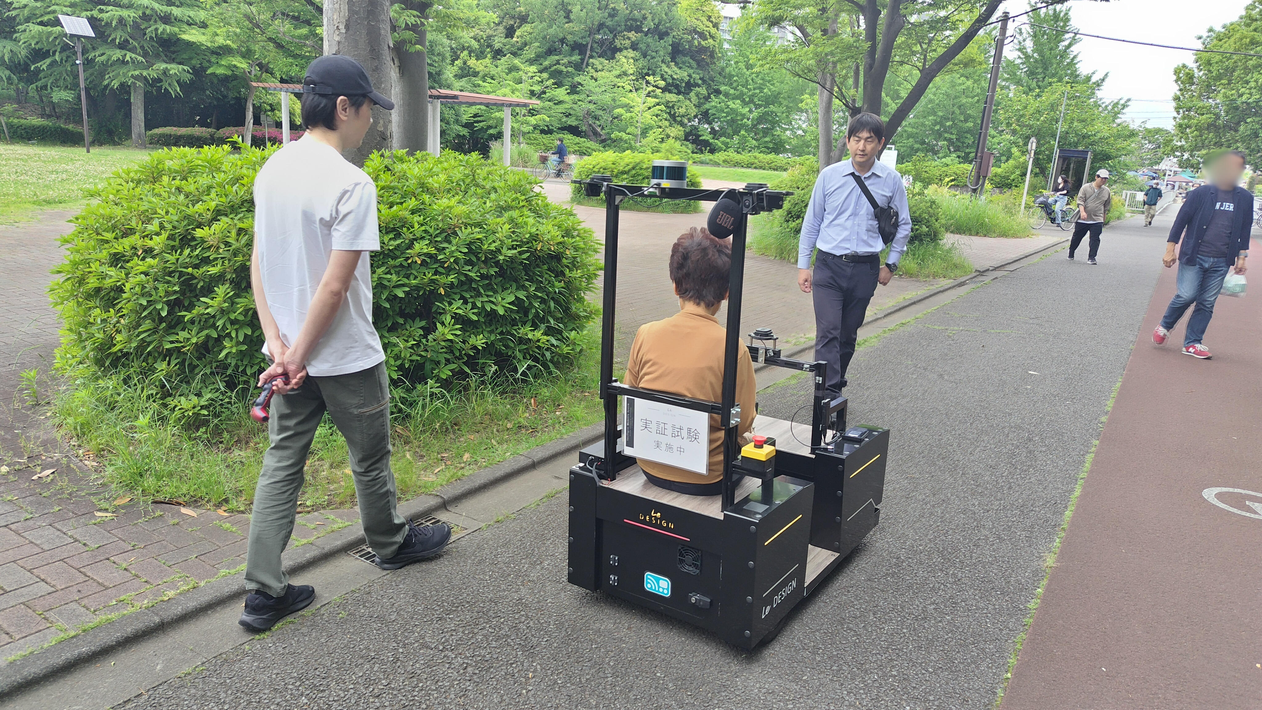 SiP Partner Mobility 人工知能を搭載した対話型自動運転モビリティ　多摩市さつき祭りで体験会.jpg